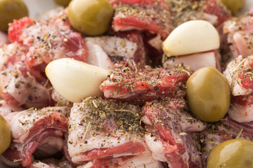 Marinade of lamb stew with herbes de Provence, garlic and olives