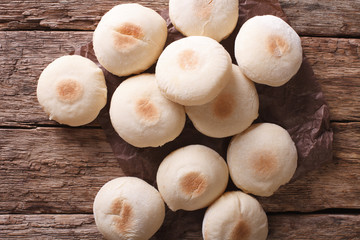 Freshly baked Moroccan bread mkhamer close up. Horizontal top view
