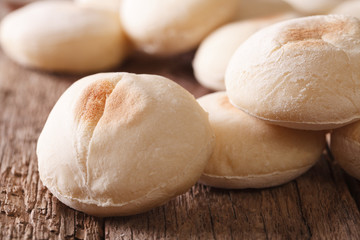 Moroccan mini bread batbout macro on the table. horizontal
