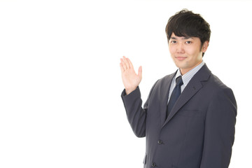 案内するビジネスマン