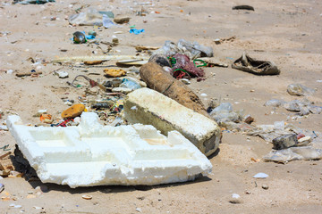 Pollution on the beach. Outdoors.