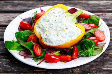 Peppers stuffed with cottage cheese, parsley, garlic.