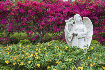Sculpture of angel in garden
