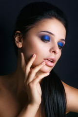 Obraz premium Beautiful woman face. Perfect makeup.Glamor closeup portrait of beautiful sexy stylish . attractive woman with colorful makeup