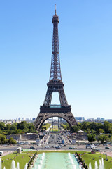 Eiffel Tower looking across from the trocadero with its famous lake and fountains photo