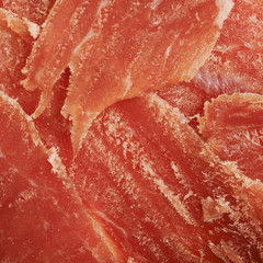 Surface covered with jamon slices