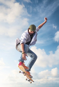 Skater on the sky background. Sport and active life concept
