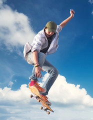 Skater on the sky background. Sport and active life concept - obrazy, fototapety, plakaty