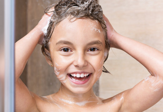 Little Girl Washing Head In Shower