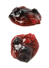 Spill of wild berries jam isolated