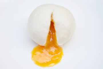 Fototapeta na wymiar Chinese steamed bun and sweet creamy stuff 