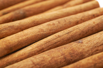 Surface covered with cinnamon sticks