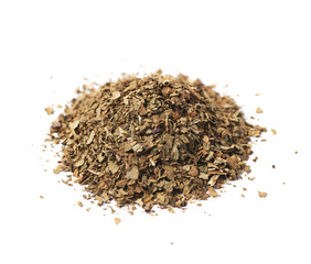 Pile of dried basil seasoning isolated