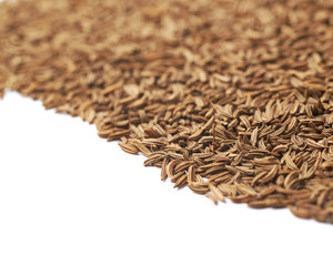 Surface covered with cumin seeds