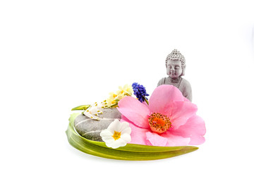 Stones whit flower and Buddha