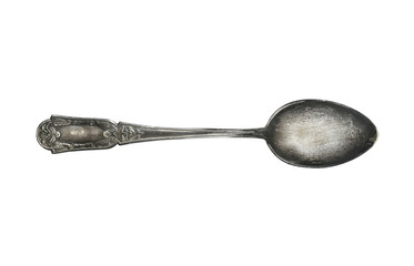 old vintage silver spoon with ornament isolated on white background