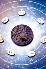 esoteric table with astrology and divination objects