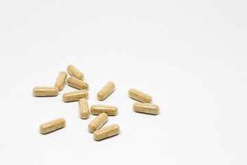 Pills on white background