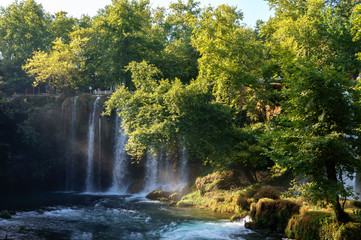 Fototapeta premium Duden waterfall in Antalya, Turkey. Waterfall surrounded by forest. Waterfall streem.