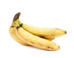 Bunch of old spotted bananas isolated