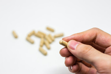 Pills on white background