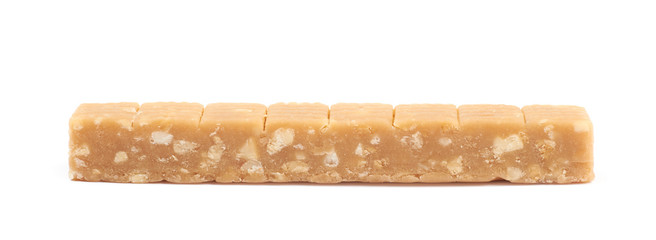 Toffee candy with nuts isolated