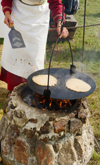 Pancakes cooking on fire