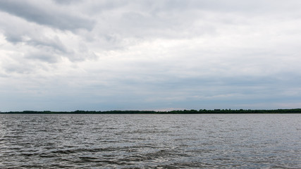 Obraz premium Summer lake near the forest.