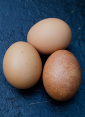 Three chicken eggs
