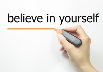 Hand with marker writing: Believe in Yourself
