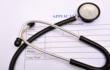 Hospital form with stethoscope on top