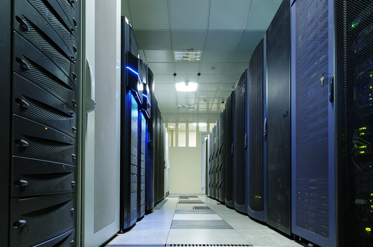 modern data center with rows of different communication equipment