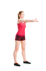 Fit woman in sportswear doing physical exercises