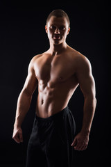 Fototapeta na wymiar Strong, fit and sporty bodybuilder man