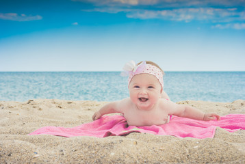 Baby on a beach 2