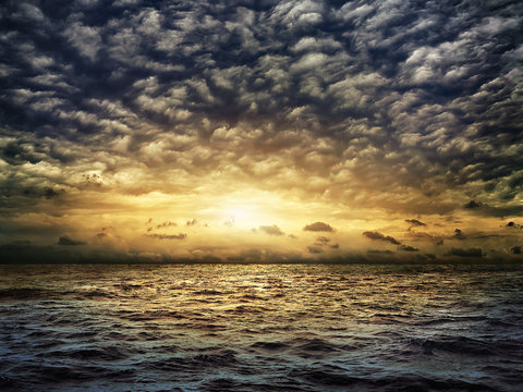 dark stormy sea with a dramatic cloudy sky
