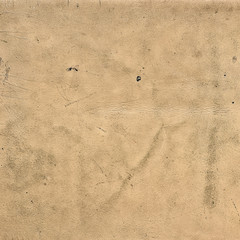 texture of old beige leather close up