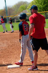 Teen baseball player and coach