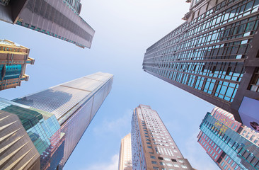 Fototapeta na wymiar Looking up at business buildings in downtown New York