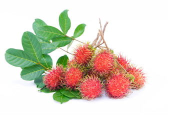 Rambutan fruit with leaves on white background