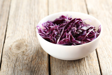 Obraz na płótnie Canvas Ripe red cabbage on a grey wooden table