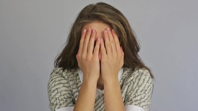Young girl making a sneer