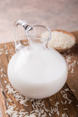 Obraz na płótnie Canvas Fresh rice milk in a glass pitcher 