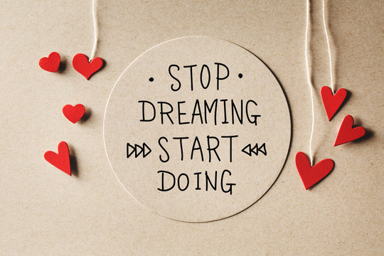 Stop Dreaming Start Doing message with small hearts