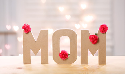 Mom letter blocks with pink carnation flowers