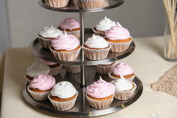 Delicious sweet buffet with cupcakes. Sweet holiday buffet with