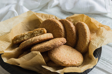 Oatmeal cookies in wooden plate