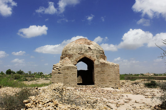 Ancient tomb in Makli hill graveyard, Beautidul Blue Skys