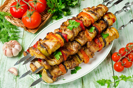 Skewers of pork and vegetables. Barbecuing lunch