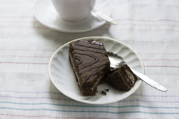 Cup on the table and cake